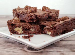 A close up stack of brownies made with chocolate espresso walnut snacks