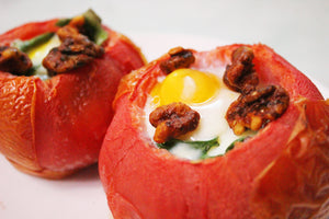 Buffalo wing walnut snacks used as a topping for stuffed tomatoes