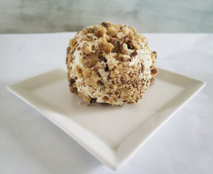Sea salt coated walnut snacks used as a coating for a cheese ball