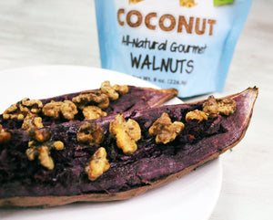 Coconut coated walnut snacks used as a topping on a purple baked potato